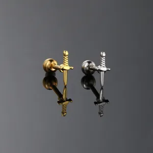 Detailed view of sword-shaped stud earrings in gold and silver stainless steel.