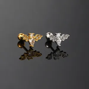Detailed macro view of bat-shaped stud earrings featuring sparkling zircon stones.