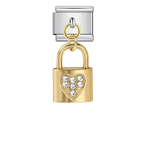Close-up of gold heart lock charm with sparkling crystals for Italian modular bracelet link