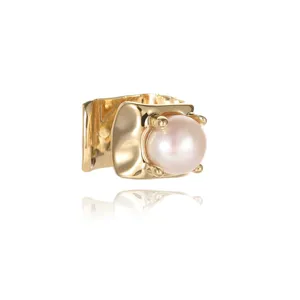 Minimalist gold square pearl ear cuff for unpierced ears, elegant studio photography