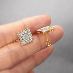 Macro view of square gold stud earrings with pave-set micro-zircon and screw-back detail