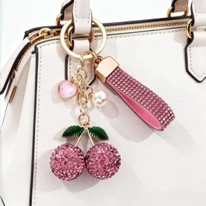 Portachiavi con ciliegie in strass scintillanti, cuore rosa e perla per borse eleganti.