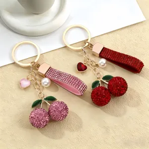 Portachiavi con ciliegie in strass ciondolo borsa metallo accessori auto brillanti chic