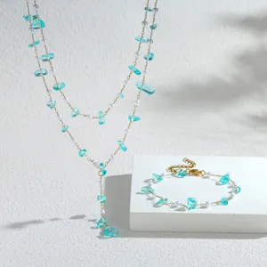 Handmade lake blue crushed stone and pearl jewelry set with necklace and bracelet.