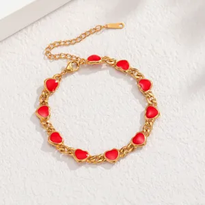 Elegante bracciale in acciaio inossidabile placcato oro 18k con ciondoli a cuore rossi