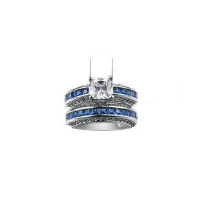 Elegante conjunto de anillos de compromiso de CZ cuadrado con espinela azul y baño de oro blanco
