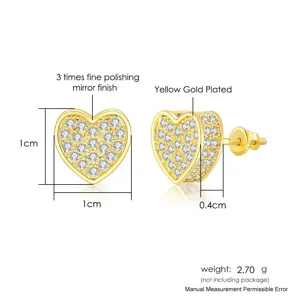 Vista detallada de los pendientes de corazón con dimensiones y acabado en oro amarillo