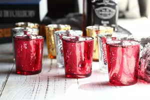 Detailed close-up of electroplated starry colored glass candle holders in various tones.