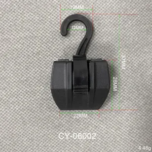 Diagramme technique montrant les dimensions et le poids d'un clip à gants en plastique