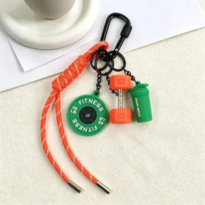 Fitness keychain sports bag charm with miniature dumbbell and barbell design for stylish everyday use.