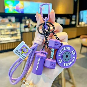 Purple gym fitness keychain bag charm with dumbbell barbell plate and shaker bottle design.