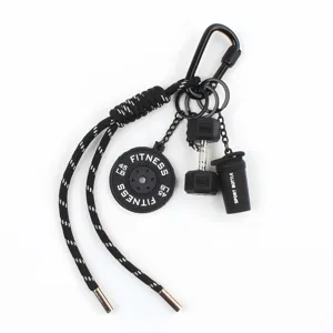 Fitness keychain bag charm featuring mini dumbbell and barbell plate design for sports fans.