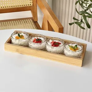 Elegantes Set aus Kristallglasschalen mit rechteckigem Bambutablett für Haushaltsdesserts