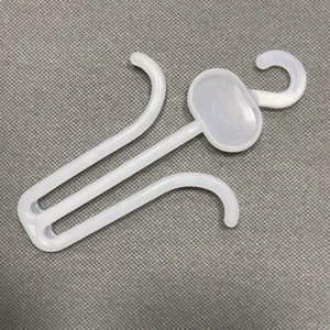 Plastic flip-flop shoe hanger hook, durable retail display hook for sandals and slippers.