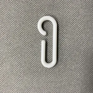 White plastic C-shaped hook for supermarket snack displays and shelf organization.
