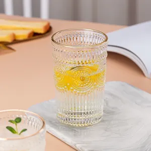 Vintage embossed sunflower glass water cup with elegant gold rim and ice glacier texture