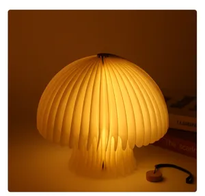 Faltbare Pilz-Buchlampe mit warmem LED-Licht, kreatives Ambiente-Nachtlicht für Schlafzimmer.