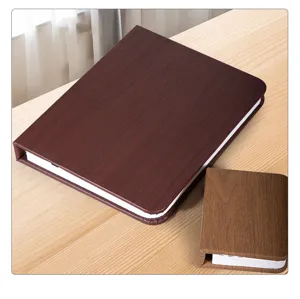 Lampada libro LED pieghevole con copertine in ecopelle venatura del legno in due misure