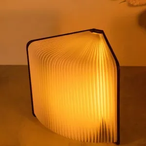 Lampada a libro a LED pieghevole creativa con luce calda e copertina in pelle PU premium