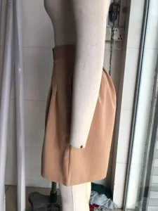Women's high waist wide leg shorts casual summer loose trousers side view detail shot.