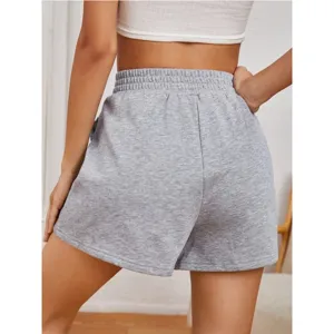 Rear view of comfortable grey high-waisted sports shorts featuring soft knit fabric