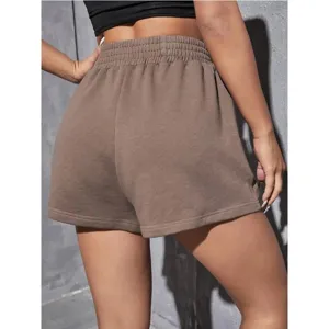 Detailed back view of brown casual sports shorts with elastic waist and soft texture