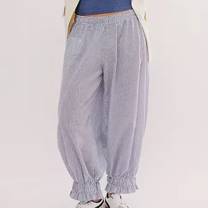 Women summer striped loose casual pants with elastic waist and cute ruffled ankles detail.