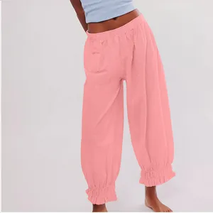 Stylish pink corduroy loose pants with ruffled elastic waist and hem for casual summer wear.