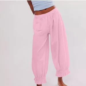 Women's pink casual trousers featuring elastic waist and ruffled cuffs for stylish daily wear.