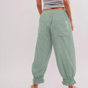 Green striped loose casual trousers feature an elastic ruffle waist and gathered ankle cuffs detail.