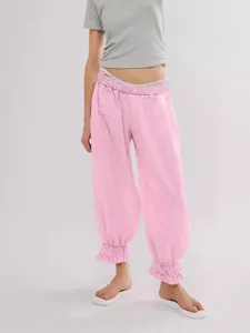 Women's pink striped casual loose trousers with elastic waist and cute ruffle hems.