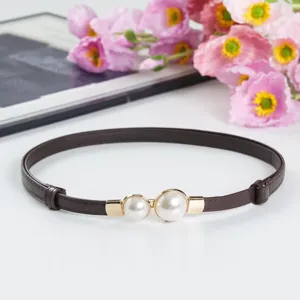 Elegant thin brown leather belt featuring a chic dual pearl gold buckle for dress styling.
