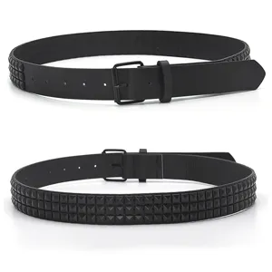 Detailed macro view of black punk faux leather belt with triple row pyramid rivets