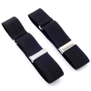Close-up detail of black elastic shirt sleeve garters featuring adjustable metal hardware.