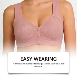 Close-up detail of the easy-to-use front button buckle on a pink lace vest-style bra