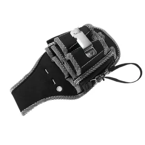 Durable canvas tool waist pouch detail shot with multi compartments and metal clip.