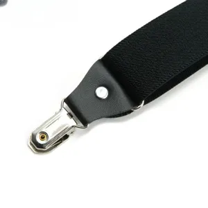 Close up view of the black elastic suspender metal clip and leather joint part.