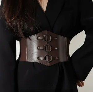 Close-up detail of a brown PU leather wide corset belt with triple metal rings.