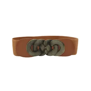 Cintura elastica larga marrone da donna con fibbia in metallo vintage per outfit casual.