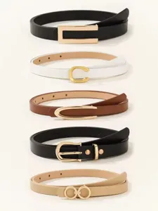 Slim leather belts with delicate metal buckles, stylish waist accessory for women.