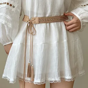 Handmade woven waist belt with tassels, vintage ethnic style dress accessory for women.