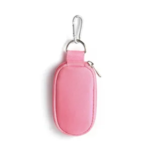 Pink portable zipper storage pouch with metal keychain clip, essential oil bottle case view.