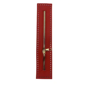 Red PU leather zipper strip DIY handmade bag accessory sewing slide fastener detail shot