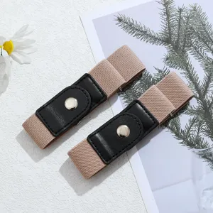 Dettaglio della cintura elastica senza fibbia, stringi-vita invisibile per jeans.