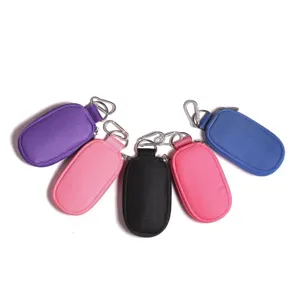 Portable mini nylon essential oil storage pouch with keychain, multi-color zipper organizer.