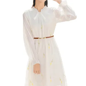 Elegant white long sleeve floral dress with thin brown belt and pearl accessory for women main view