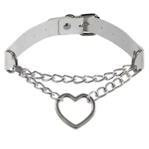 White leather heart choker necklace detail, punk style double chain metal neck ring accessory.