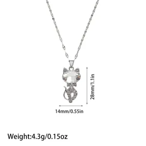 Detailed view of silver cat pendant necklace featuring crystal and rhinestone inlay