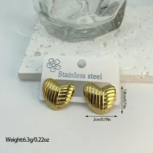 Gold-toned ribbed heart stud earrings in stainless steel showing size and weight details
