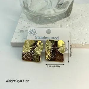 Detail view of golden stainless steel geometric earrings with striped texture and weight info.